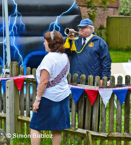Bugler Paul Simmons welcoming the mayor