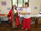Mayor looking at prize winning pudding