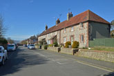 Houses in Middle Street Falmer Village in March 2015