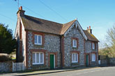 Flint and brick house in Park Street Falmer in March 2016
