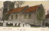 Hand-tinted photograph of the exterior of Falmer Church and churchyard c.1905