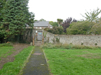 Flint wall at Moulsecoomb Place in October 2022