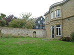 South East end Moulsecoomb Place with Tithe Barn behind