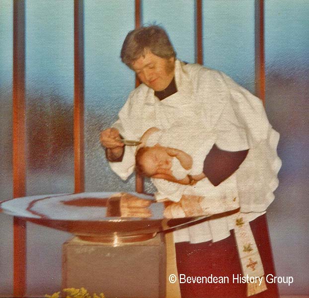 Font being used for a baptism 1970s