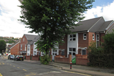 Flats on site of St Albans Church July 2015 from Coombe Road