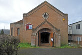St Cuthman's Church main door from Whitehawk Way Feb 2011
