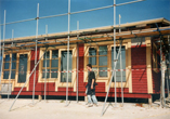 A house partly painted March 1999
