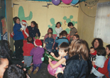 The children enjoying Christmas in the creche Dec 1999