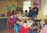 The children enjoying Christmas in the creche Dec 1999