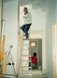 Painting the inside of one of the houses December 1999