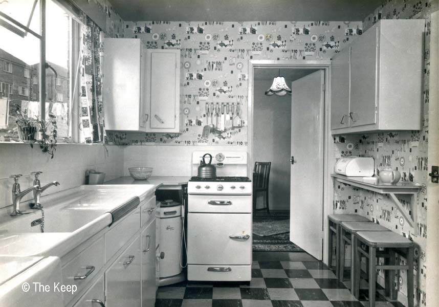 The kitchen looking towards the back door