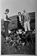 1930c Grandpa Allcorn feeding chickens