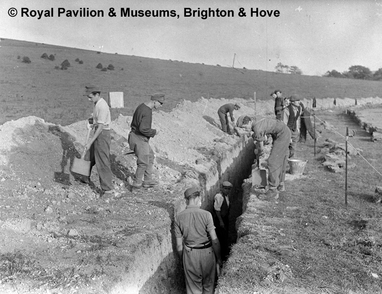 German Prisoners filling in a sewer trench 13 October 1945 at Bevendean
