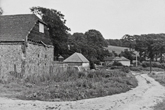 The long barn and other farm buildings photographed about 1949/1950 when this was just a country area to the north of Brighton. The farm buildings were on the other side of Coldean Lane from the Menagerie cottages.