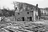 Demolition of Menagerie Cottage photographed in December 1955, when destruction was well under way, the adjoining cottage having already been removed.
