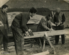 1949 Building own houses - Tom Longley with saw