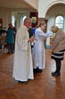 Distribution of Communion Fr David Biggs & Rev Alice Whalley