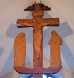 Carving of Christ, St Mary & St John on beam above Sanctuary